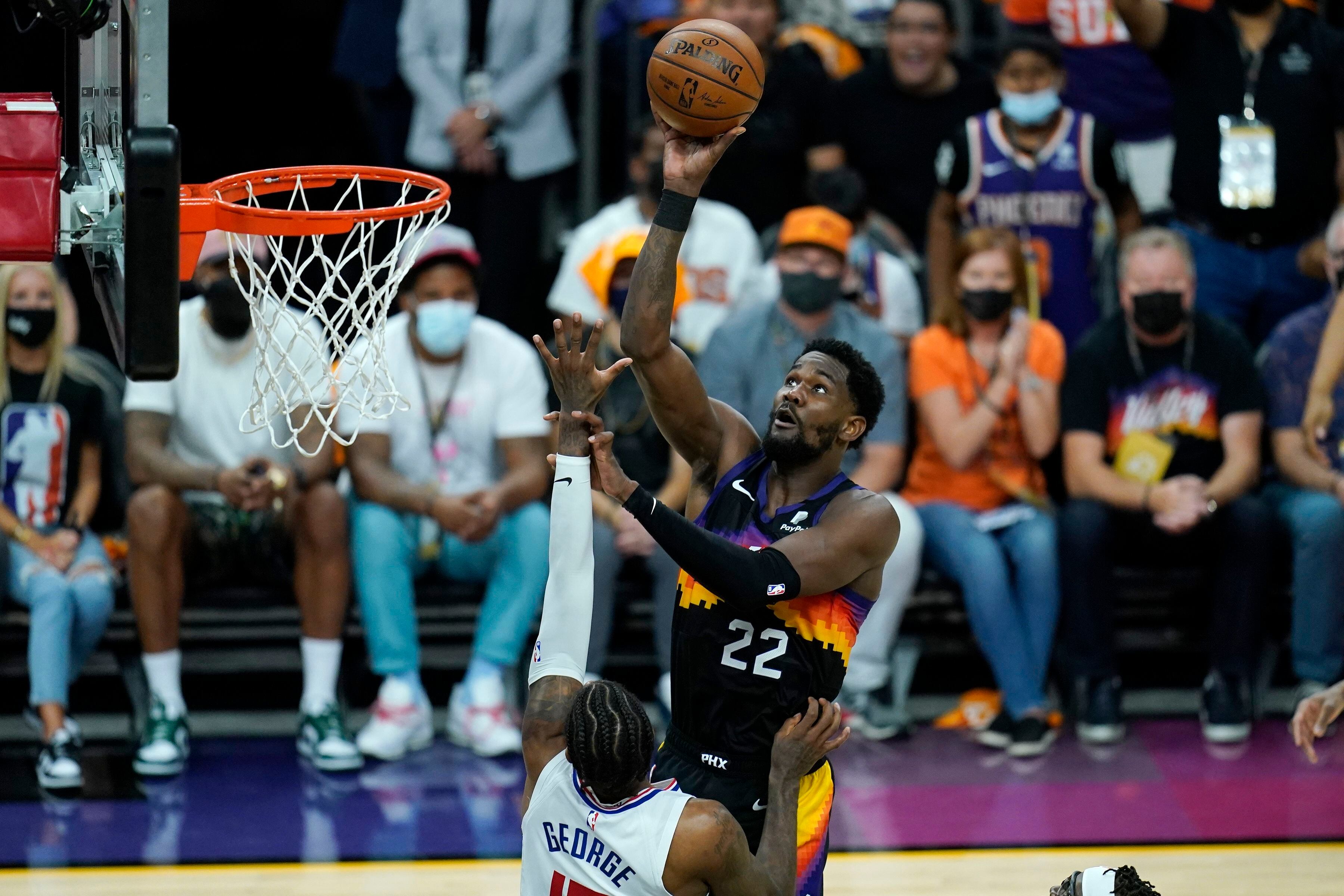 Booker gets first triple-double, Suns beat Clippers 120-114