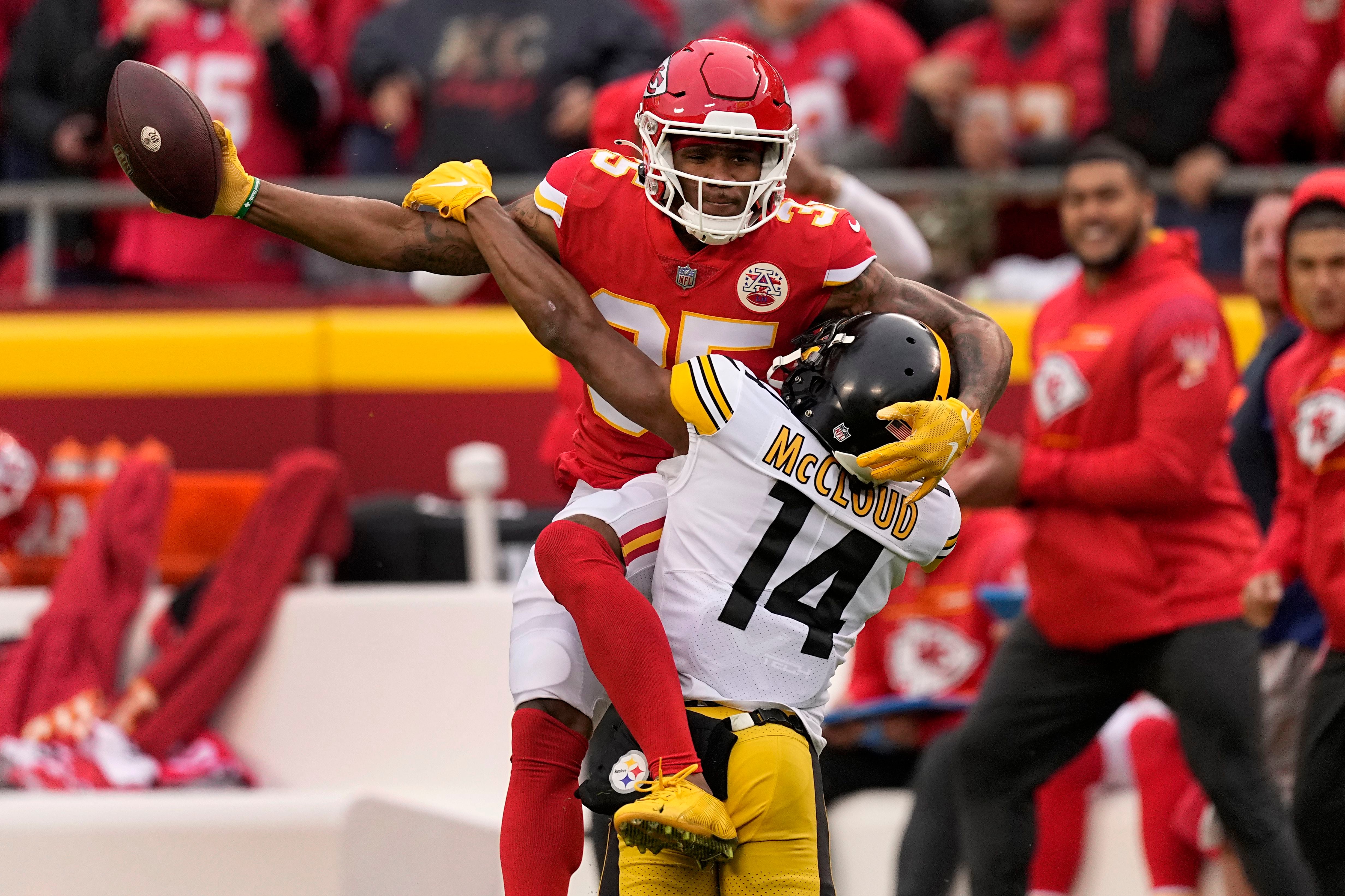 Dallas Cowboys cornerback Anthony Brown (3) defends as Tampa Bay Buccaneers  wide receiver Mike Evans (13) catches a pass in the second half of a NFL  football game in Arlington, Texas, Sunday