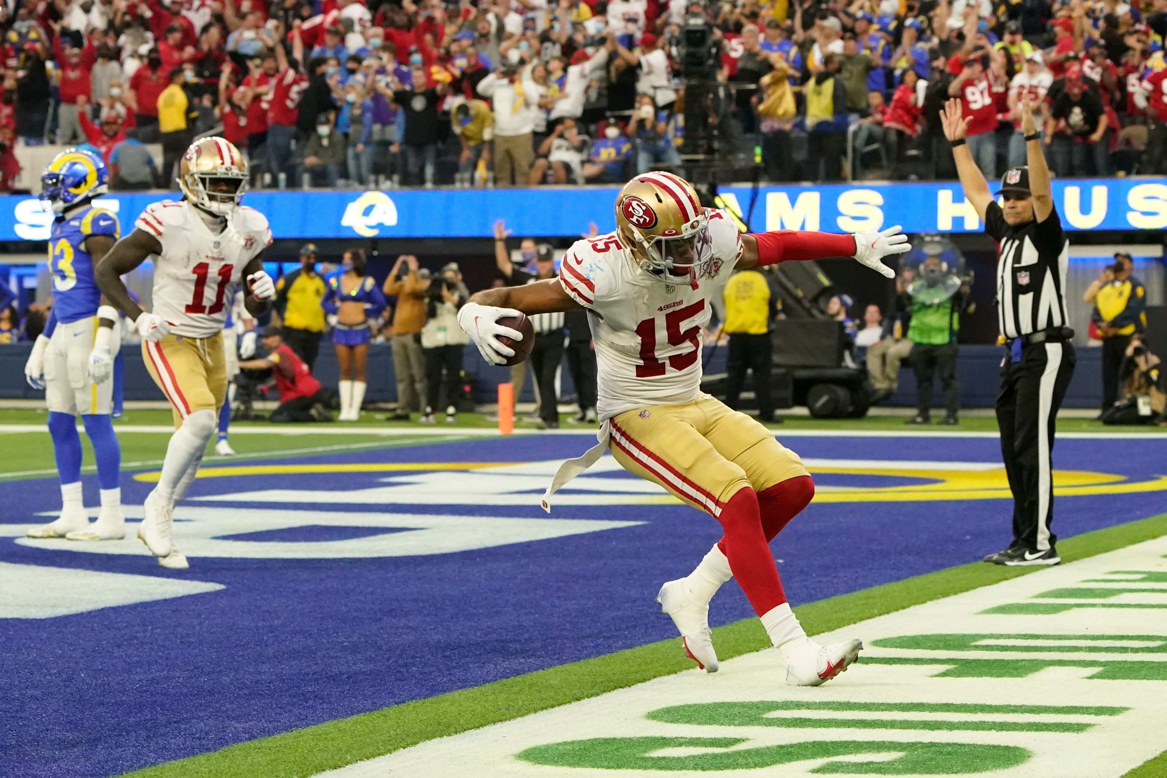 49ers clinch playoff berth by holding off Rams 27-24 in OT