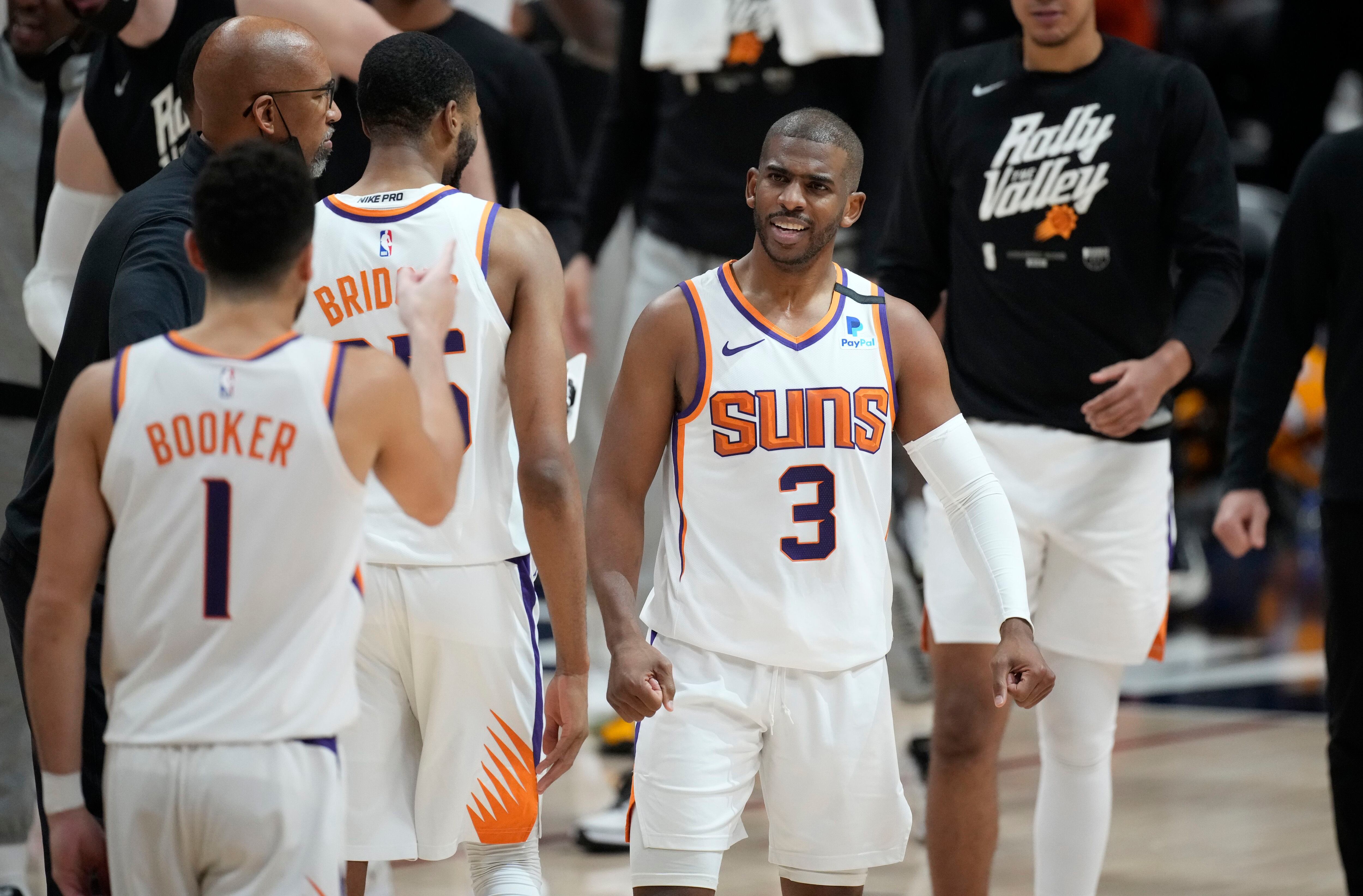 LeBron James congratulated Devin Booker post-game with a signed