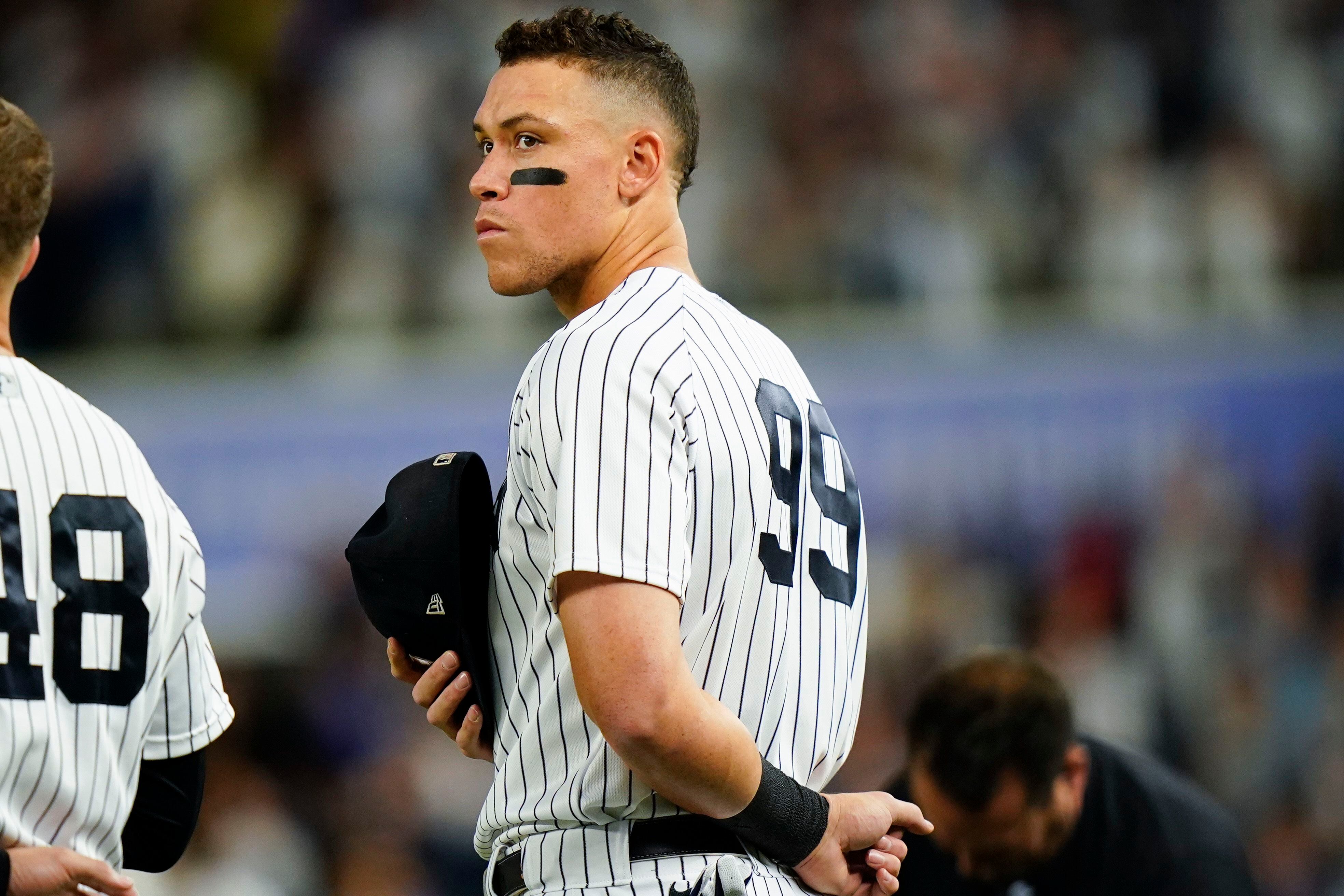 Judge falls just short of 61, Yanks clinch playoff berth