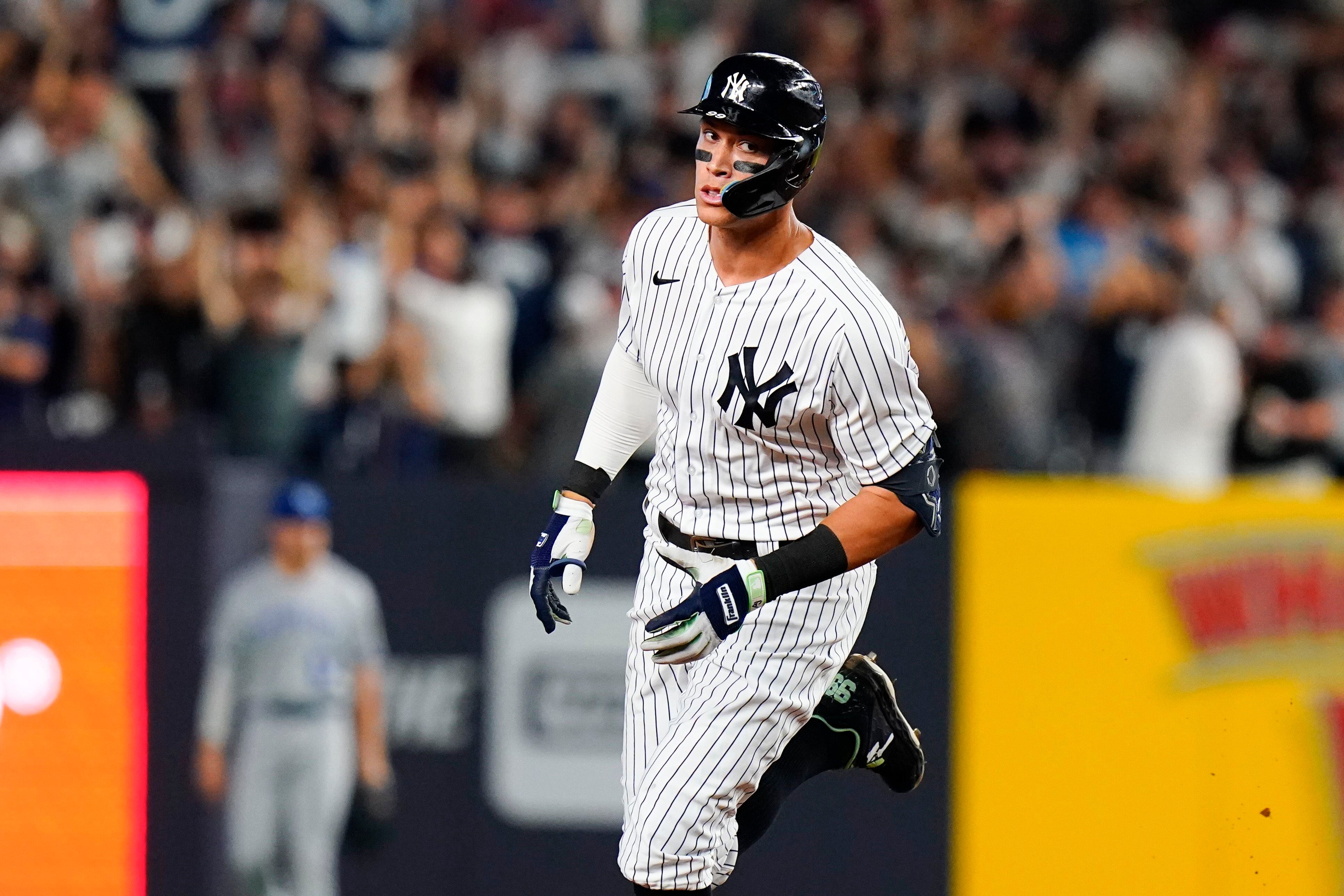 Late homers lift Yankees to series win over Royals