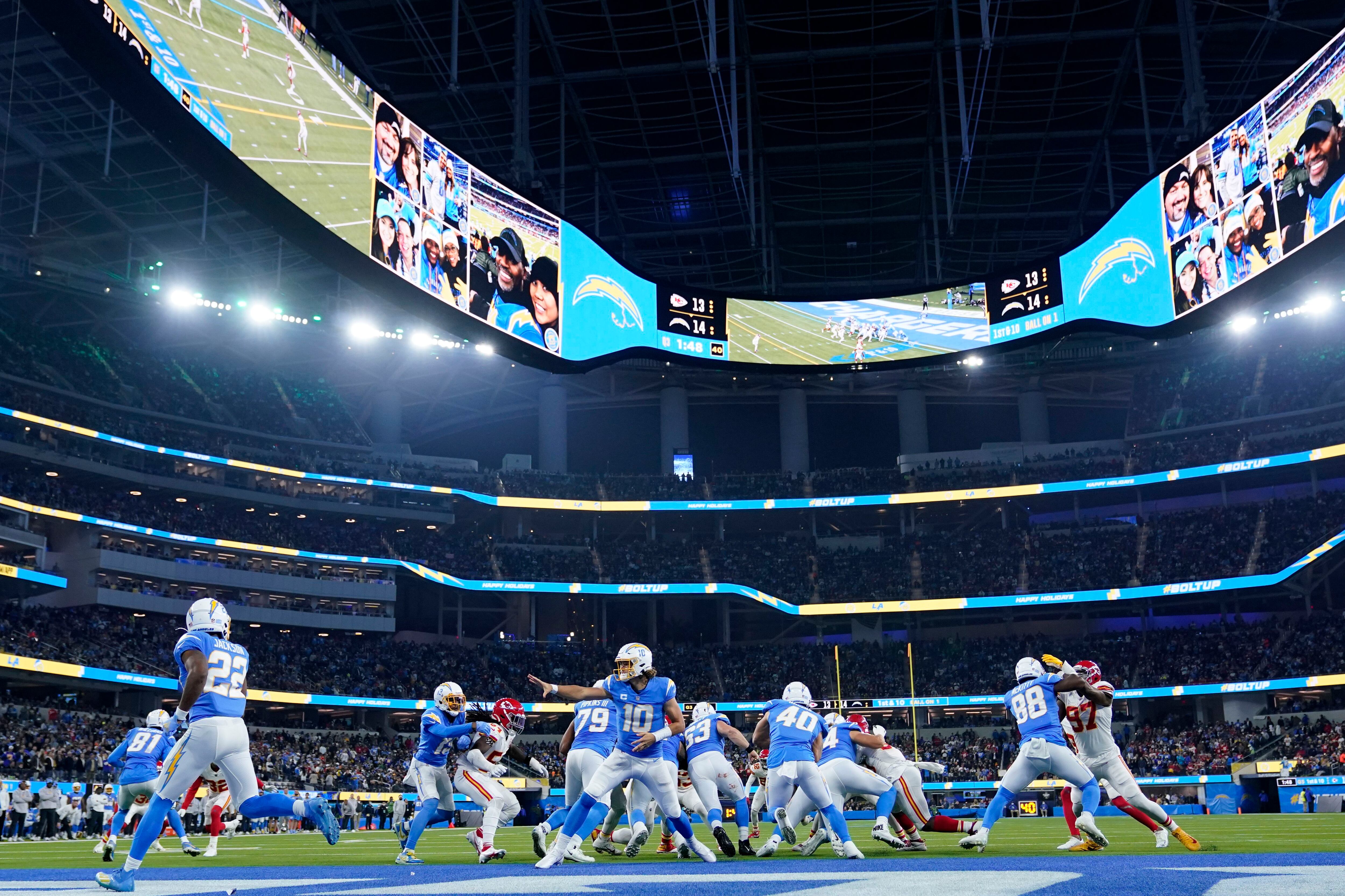 Los Angeles Chargers quarterback Justin Herbert throws a pass during the  first half of an NFL football game against the Kansas City Chiefs,  Thursday, Dec. 16, 2021, in Inglewood, Calif. (AP Photo/Marcio