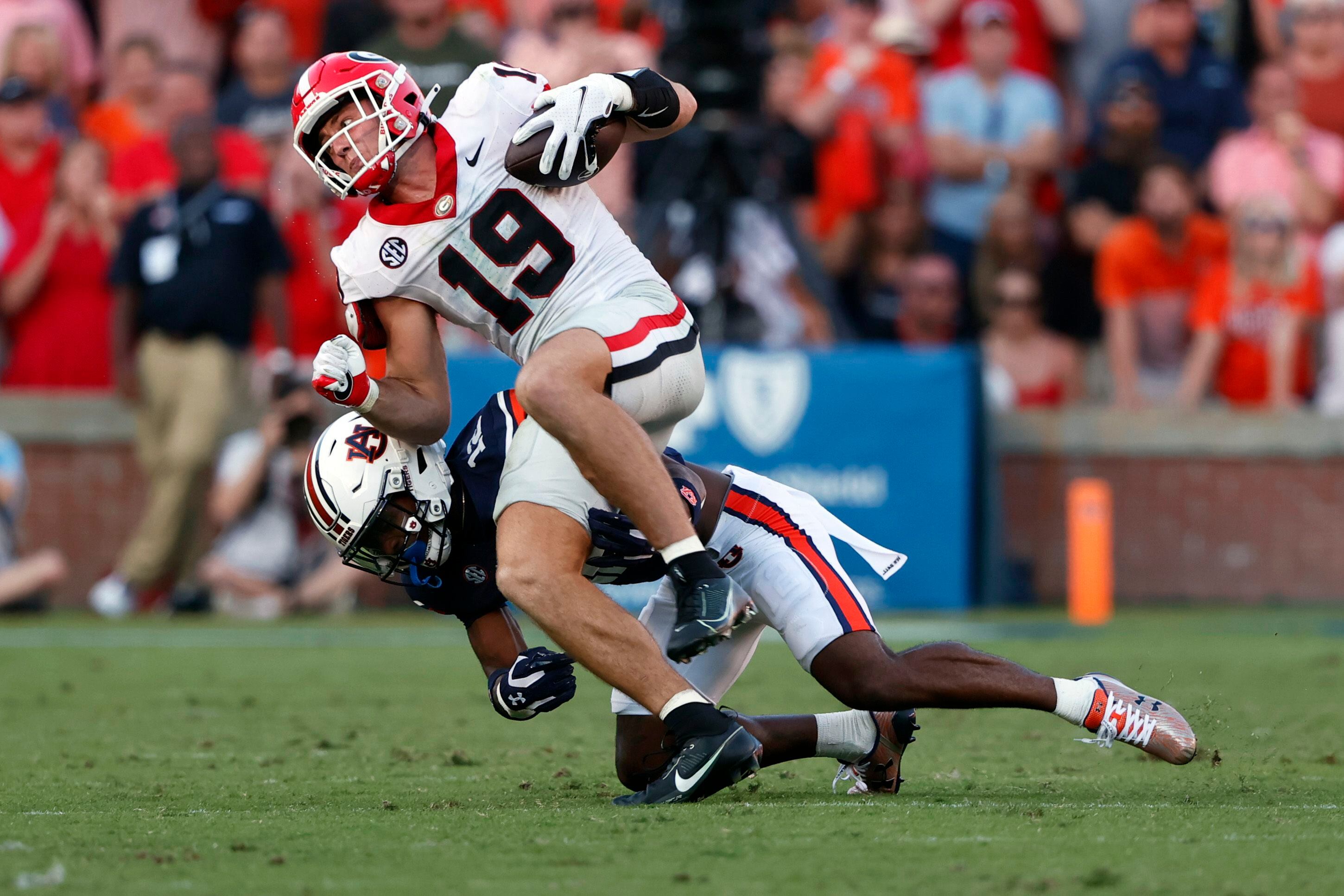 Brock Bowers Georgia Bulldogs Football White Uniform Student