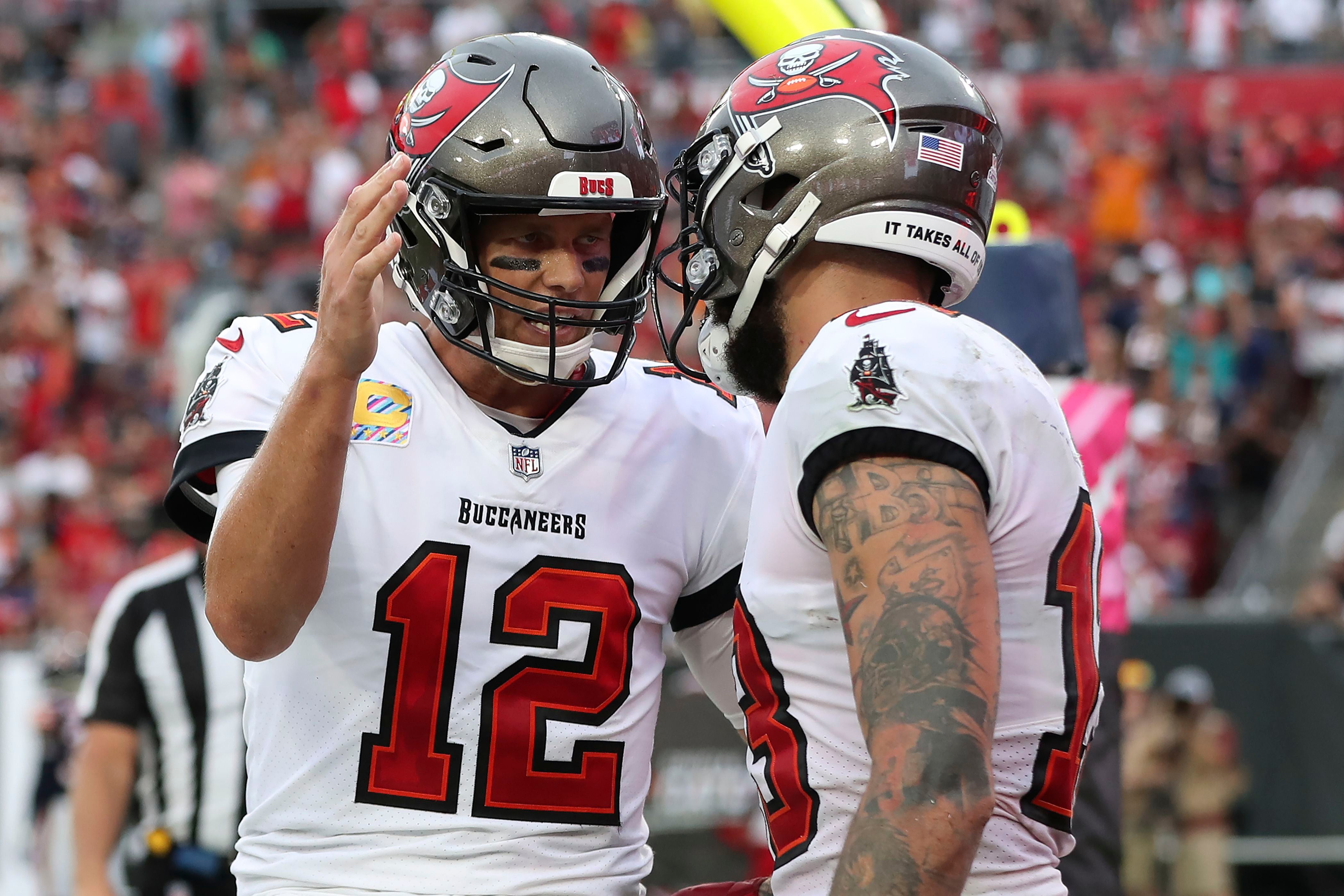 Head coach Jon Gruden of the Tampa Bay Buccaneers shakes hands