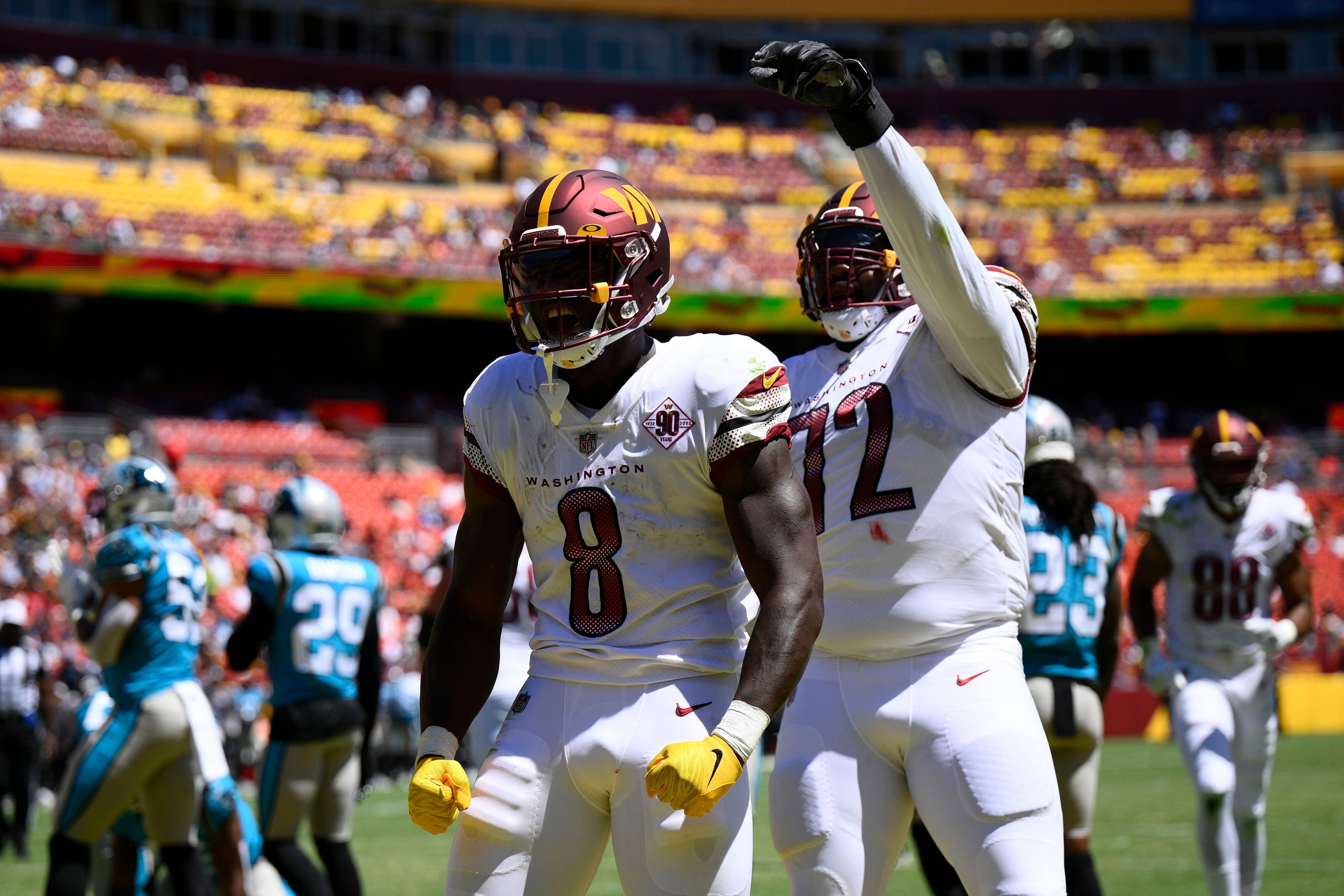 Washington Commanders quarterback Carson Wentz (11) in action during the  first half of a preseason NFL football game against the Carolina Panthers,  Saturday, Aug. 13, 2022, in Landover, Md. (AP Photo/Nick Wass