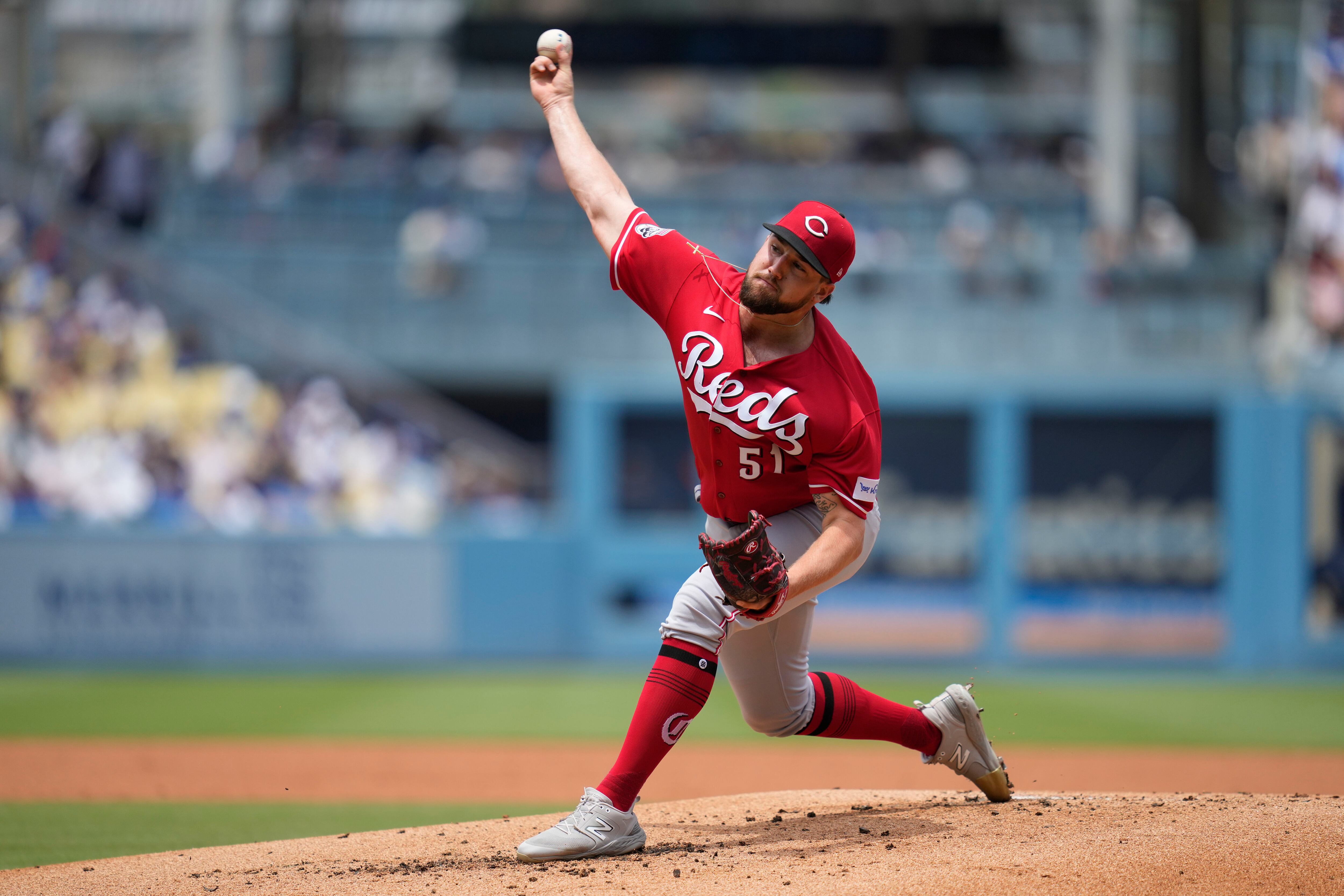 De La Cruz launches homer, but Brewers edge the Reds 3-2