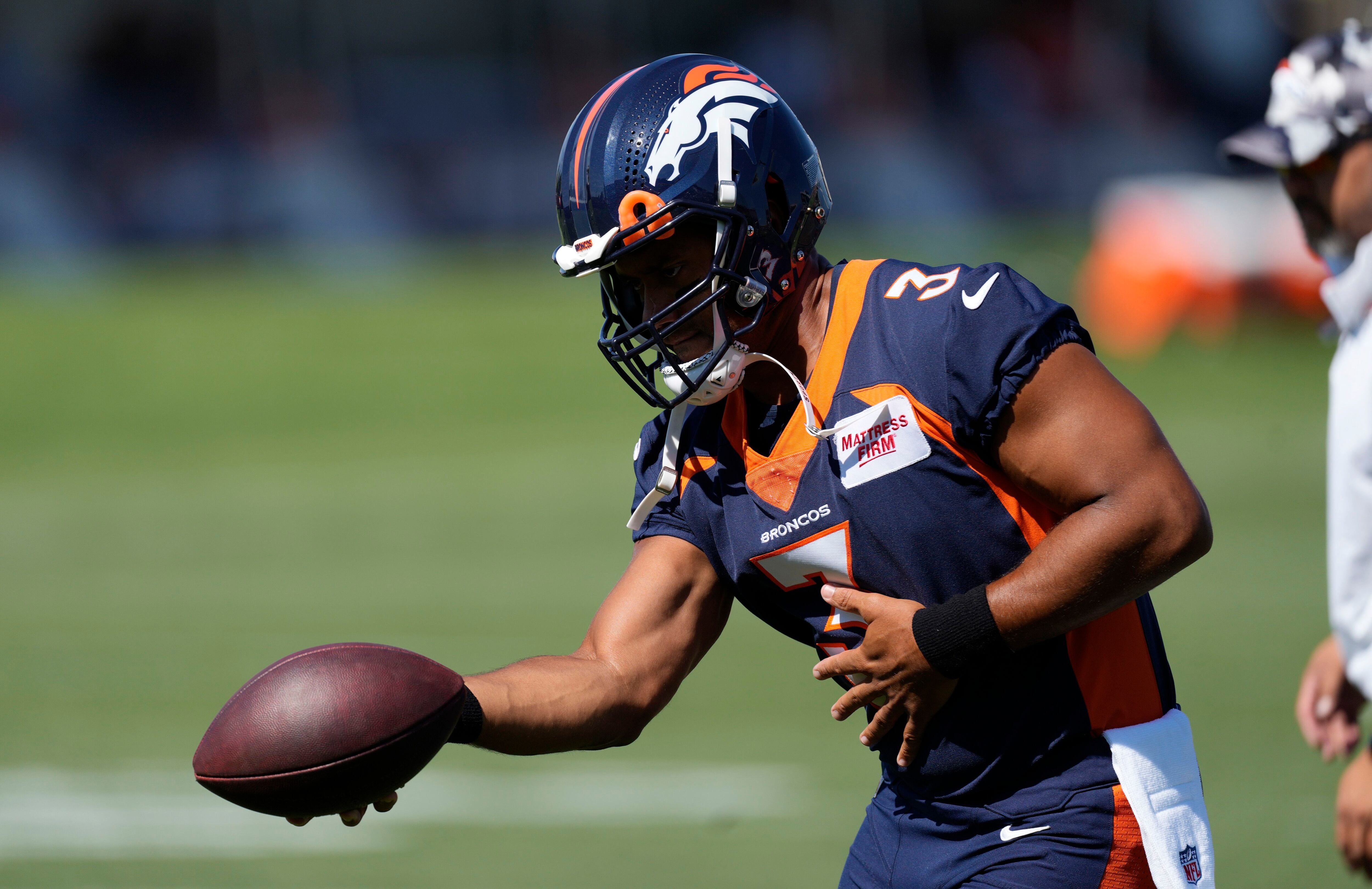 Russell Wilson ushers in new Broncos era, in a hurry to win