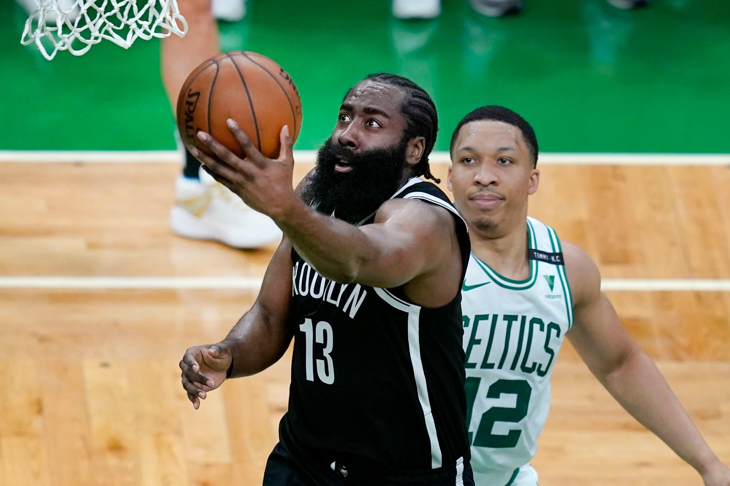 Fan at TD Garden detained, cuffed for throwing water bottle at Kyrie Irving  after Game 4