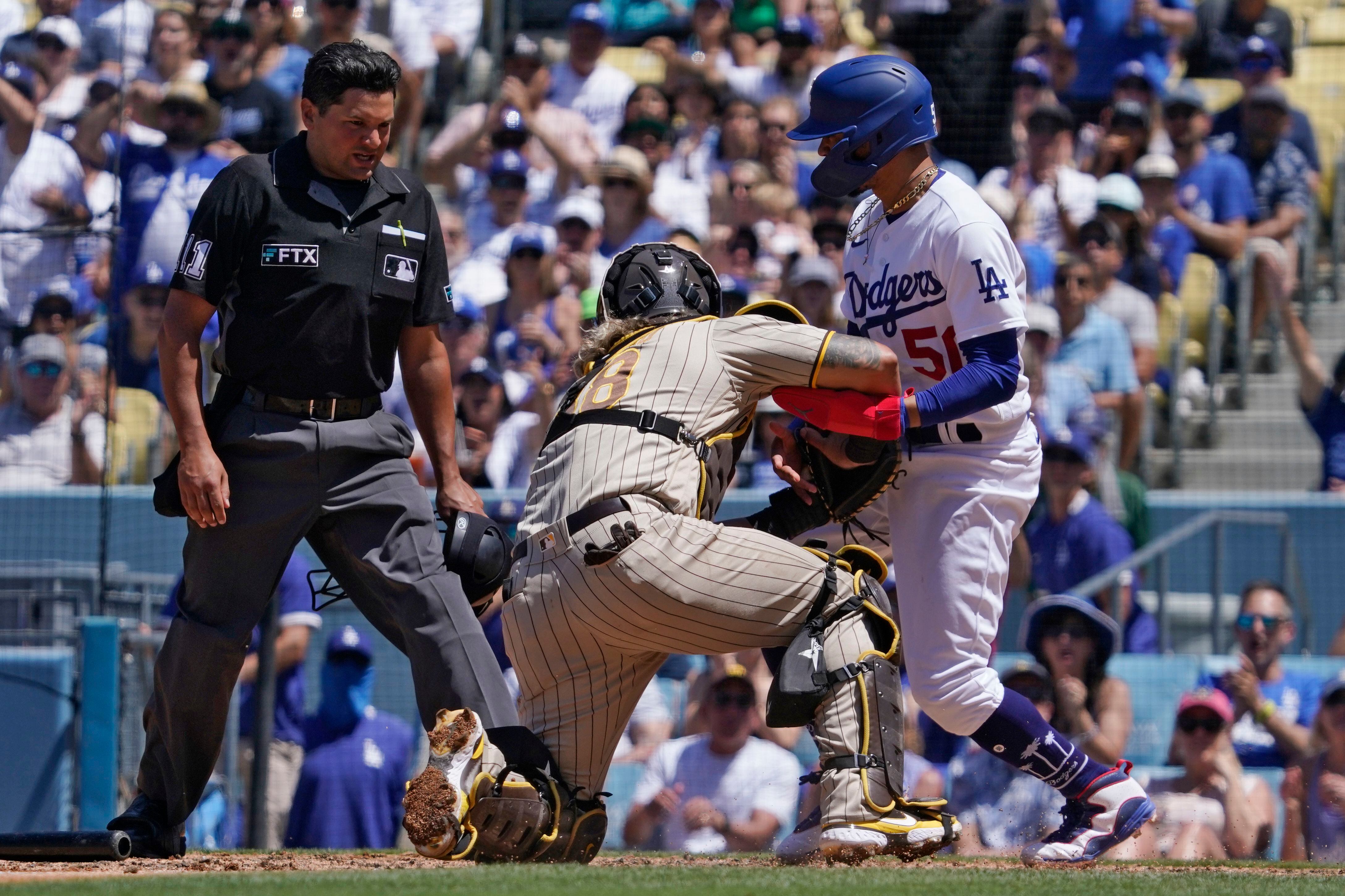 Los Angeles Dodgers' Hanser Alberto (17) scores on a double hit by