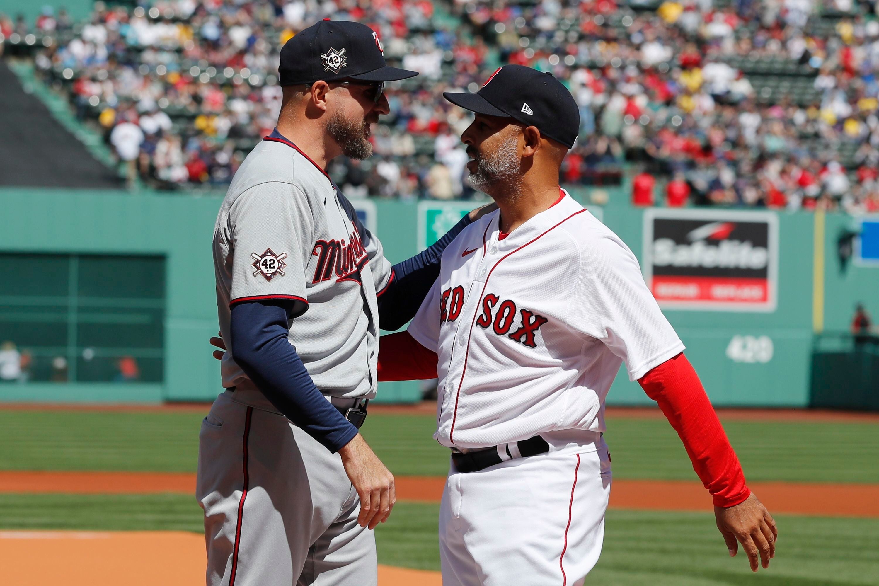 Ryan strong, Twins' bats heat up in Boston's Fenway opener