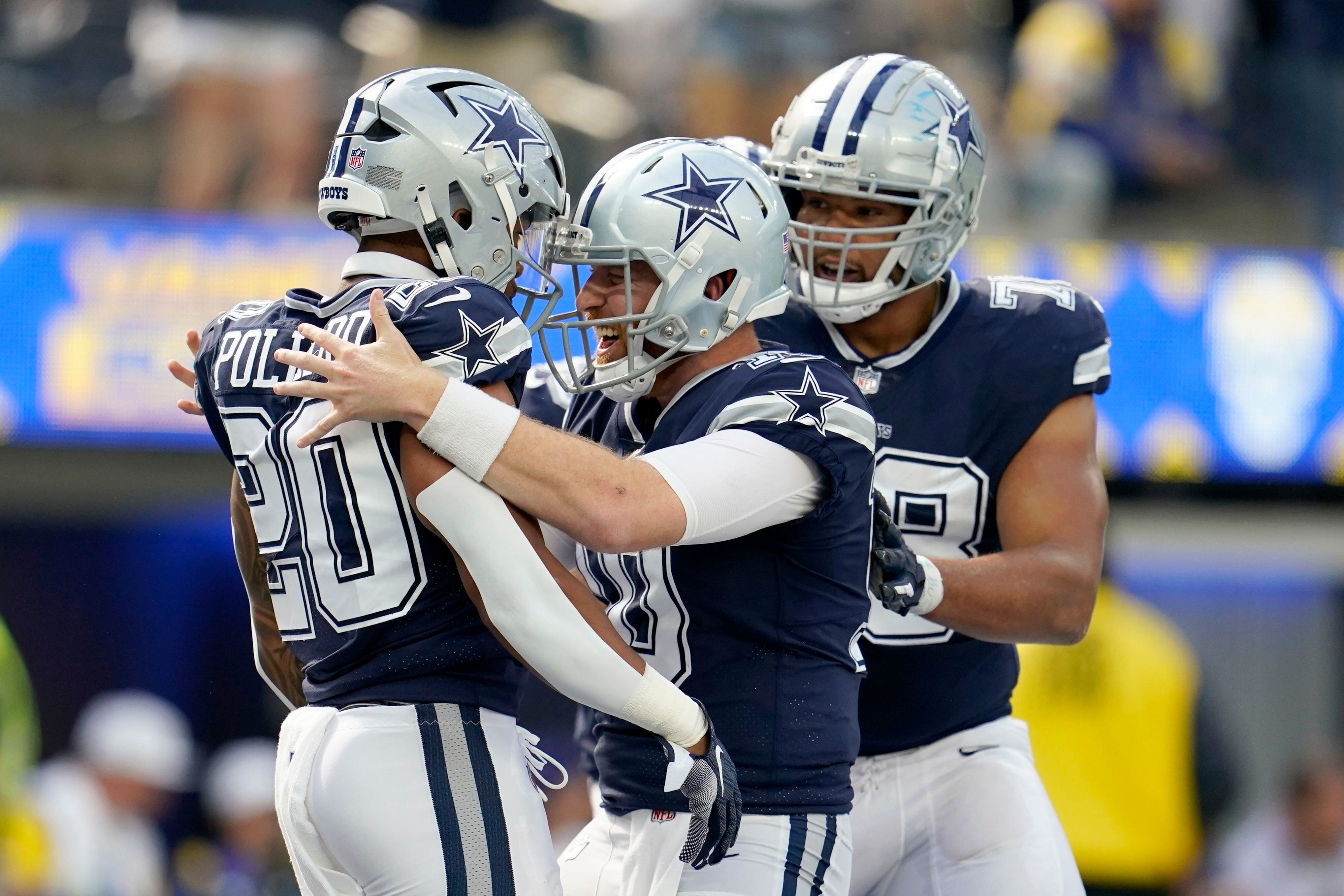 Dallas wins 4th straight, dominate Washington 56-7