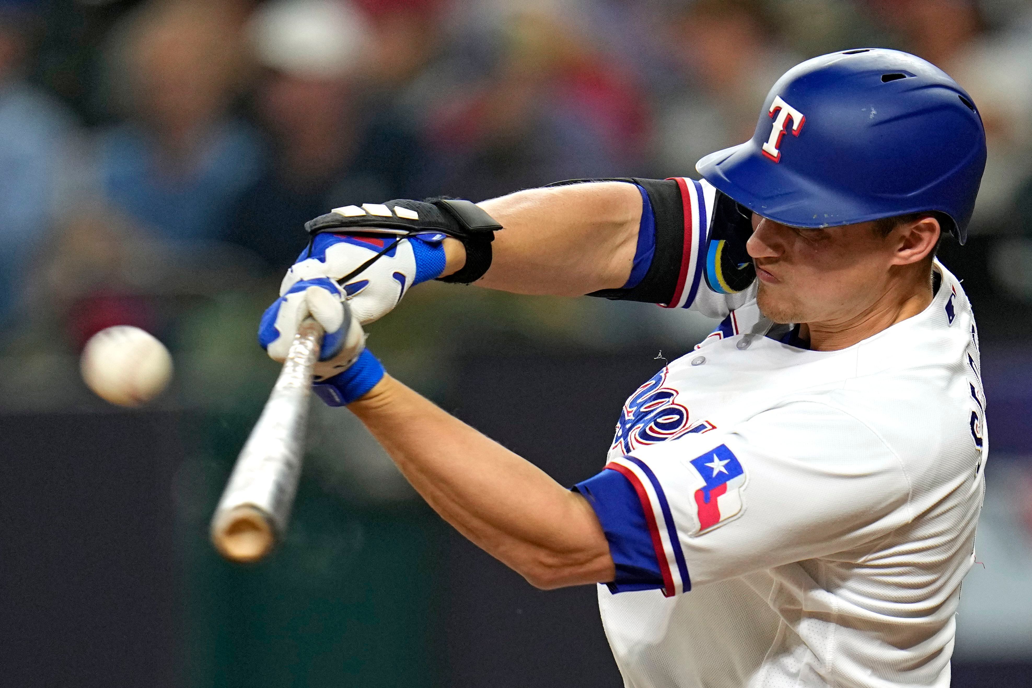 Adolis Garcia drives in 4, Rangers beat Braves 7-3 to take series - NBC  Sports