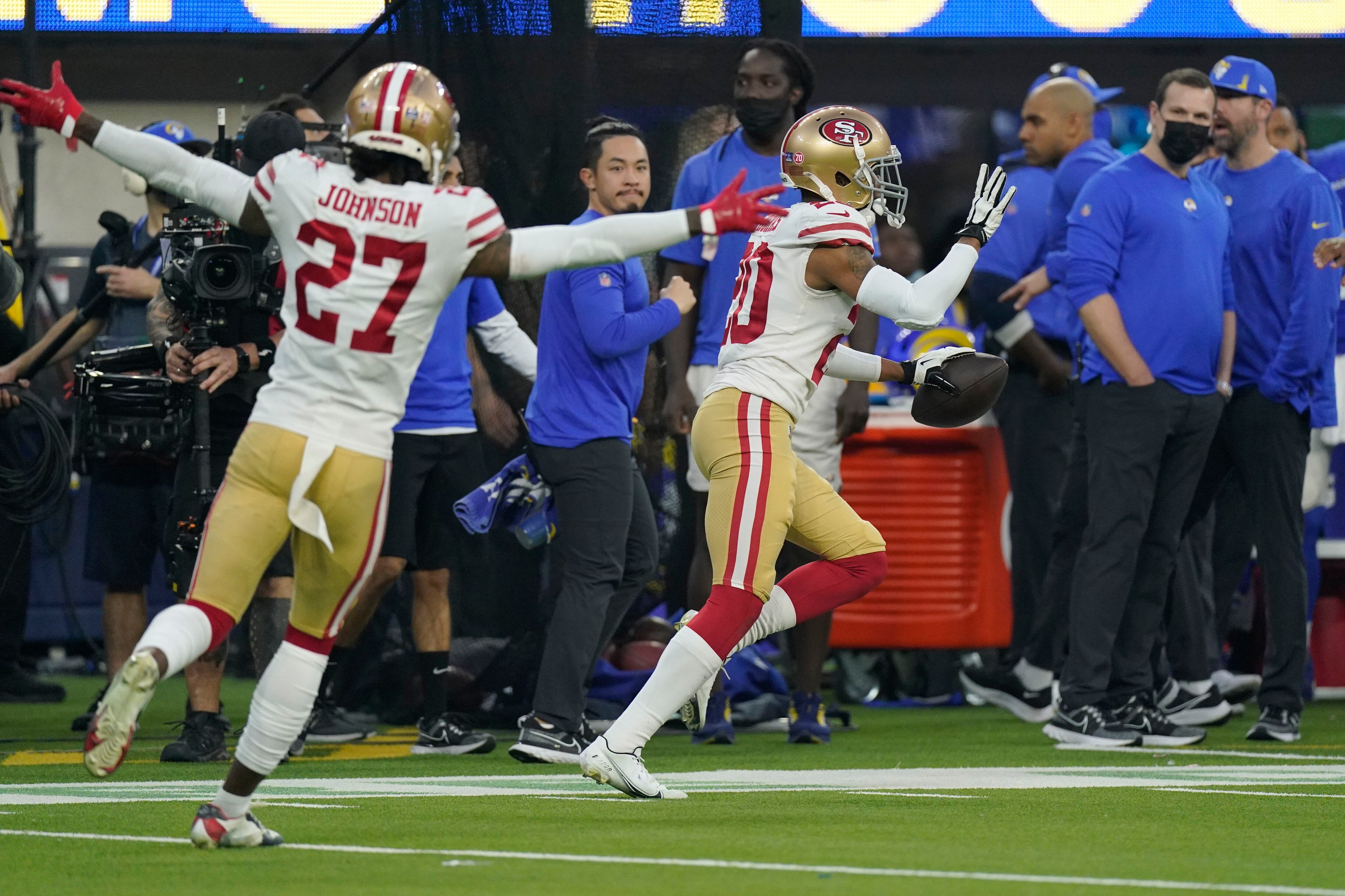 49ers clinch playoff berth by holding off Rams 27-24 in OT