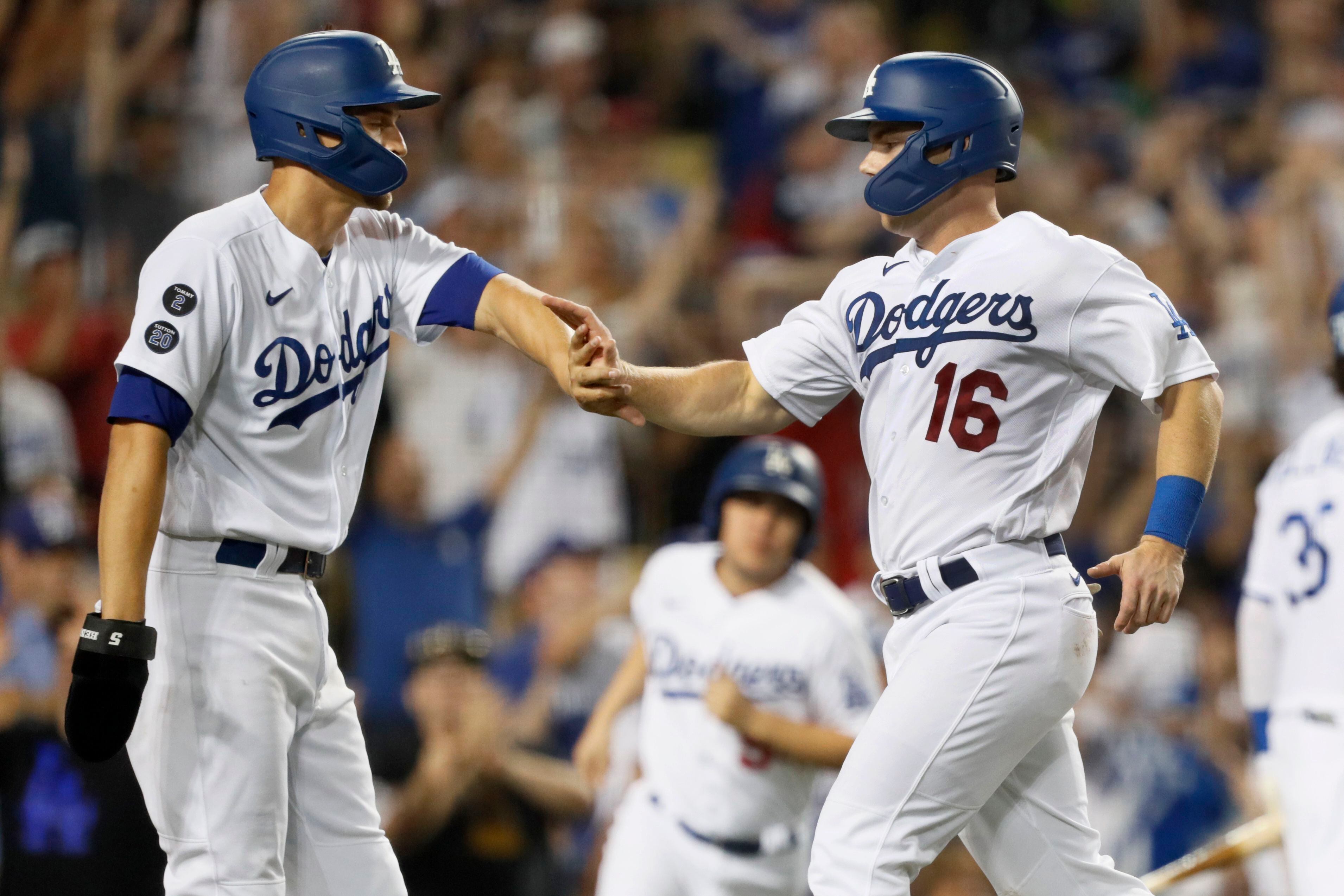 Trea Turner and Chris Taylor of the Los Angeles Dodgers celebrate