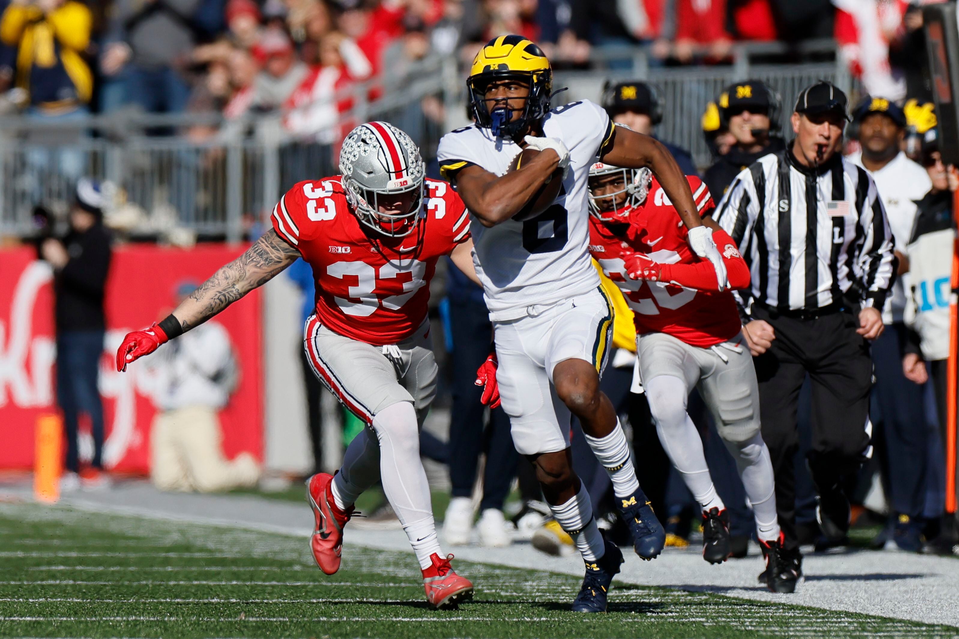 No. 2 Ohio State beats No. 10 Michigan 56-27 for record run