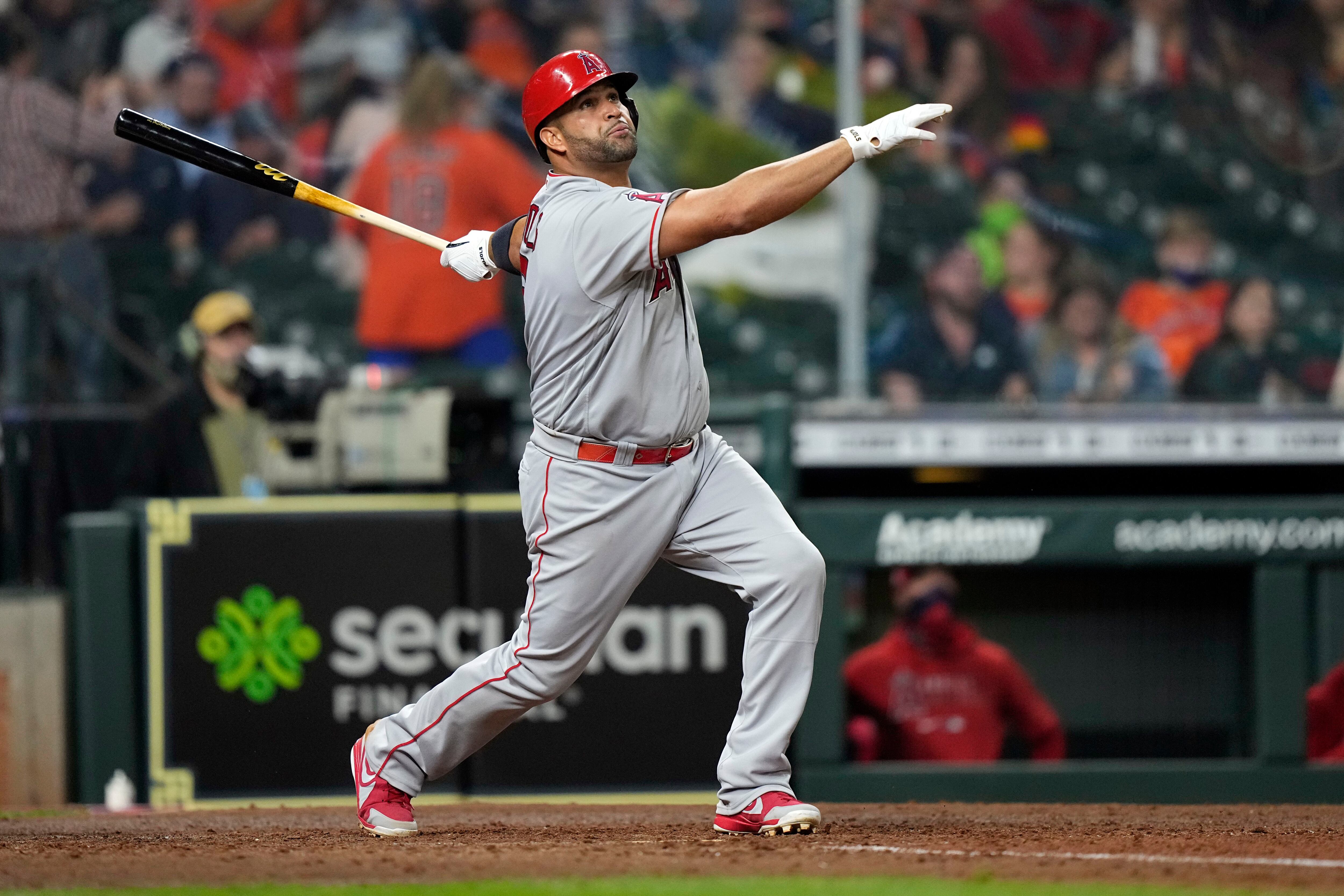 St. Louis Cardinals slugger Albert Pujols proudly displays his