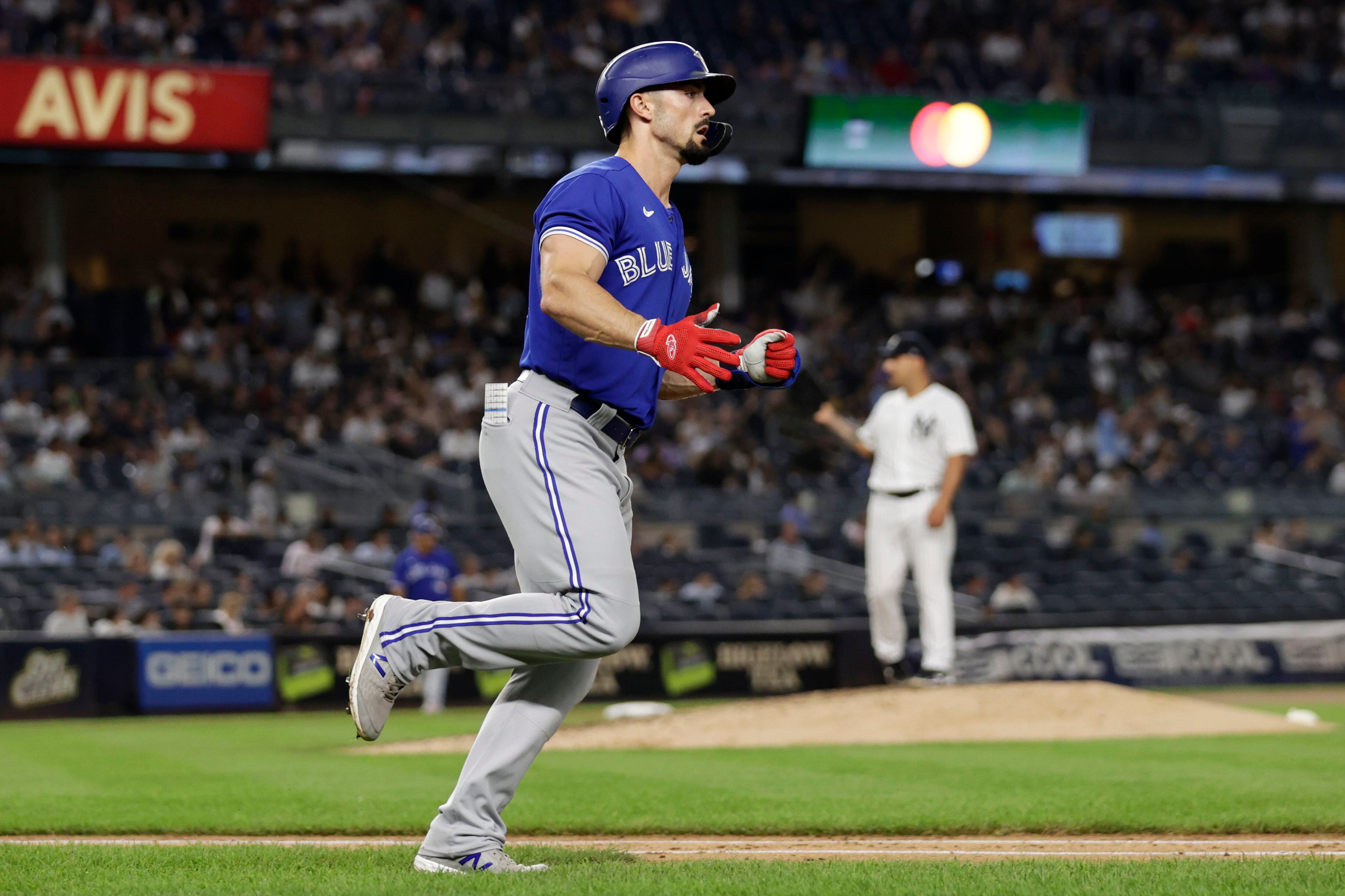 Toronto Blue Jays' Vladimir Guerrero Jr. (27) is congratulated for his solo  home run against the Boston Red Sox during the first inning of a baseball  game Friday, Aug. 4, 2023, in