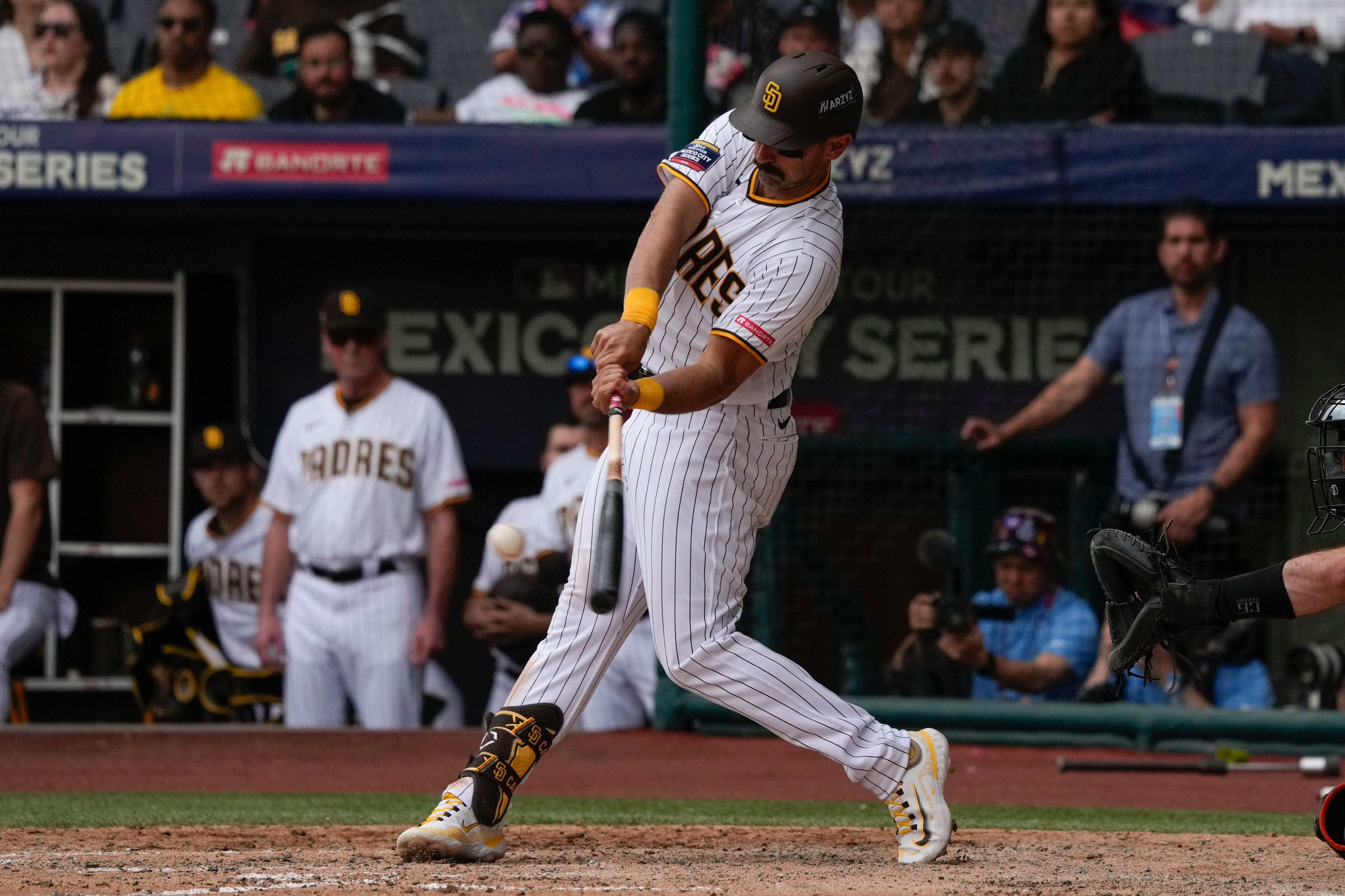 Rougned Odor of the San Diego Padres celebrates hitting a double