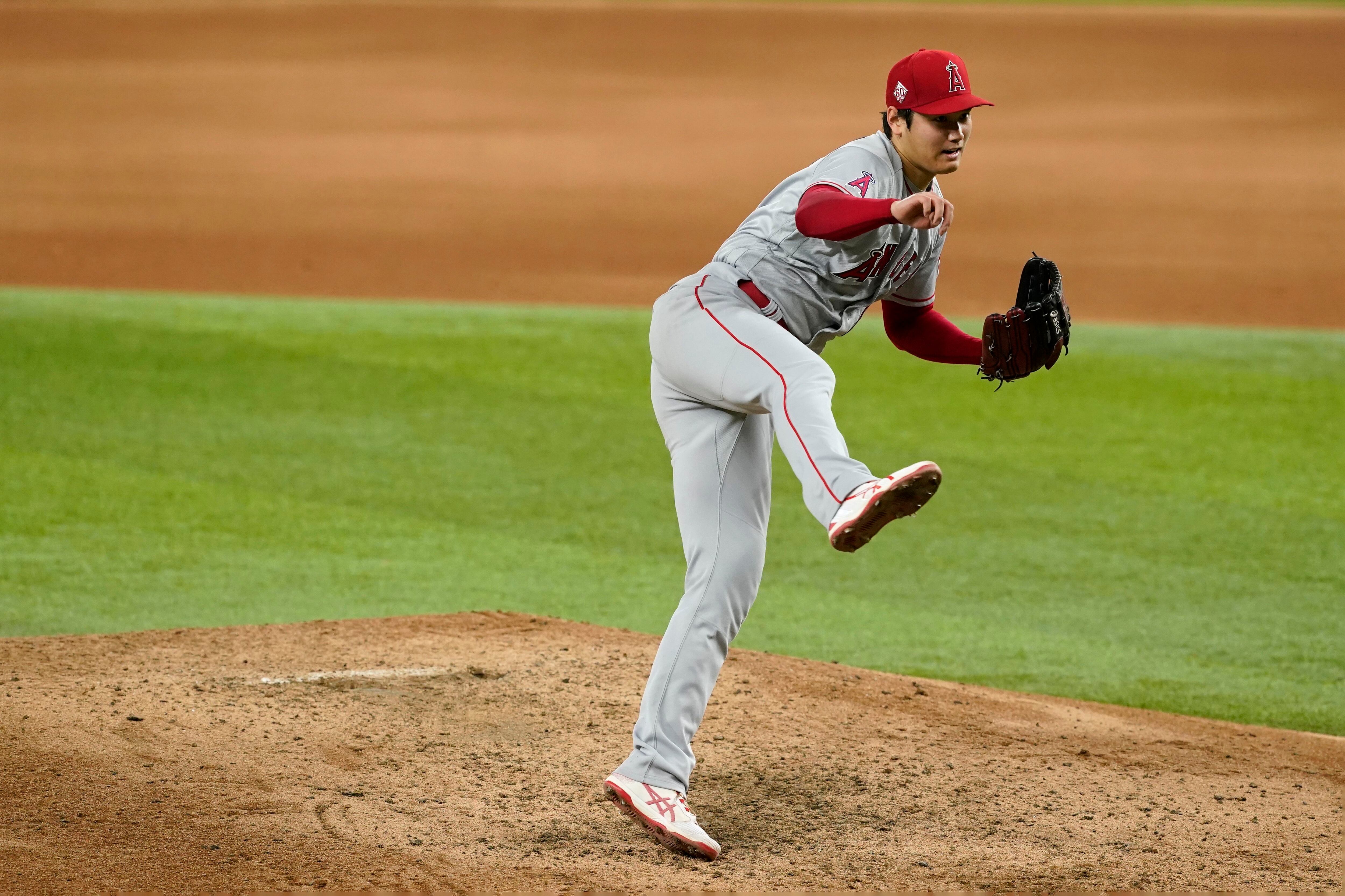 Shohei Ohtani pulled by Angels after 4 scoreless innings with cramps in  pitching hand