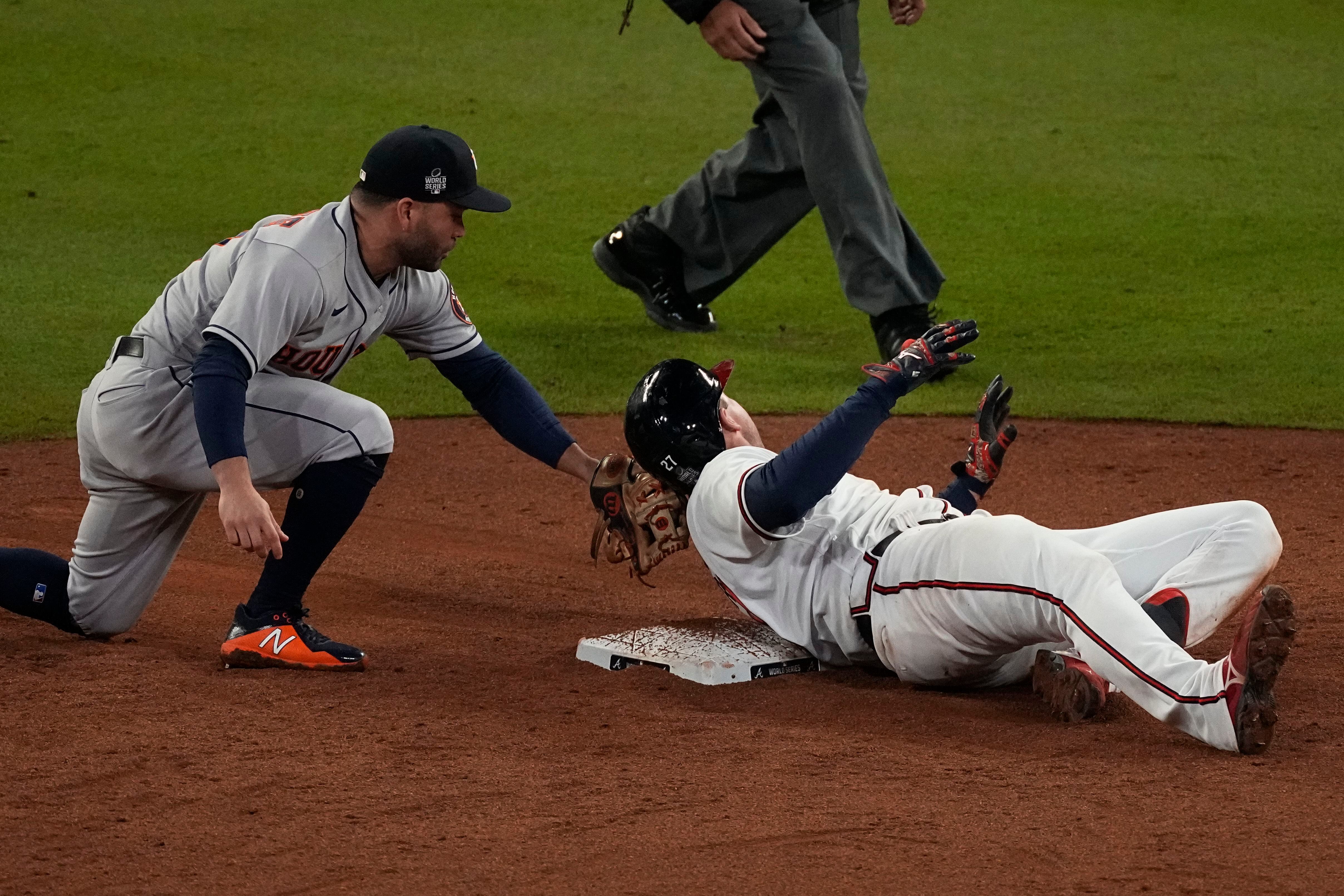 Unlikely hero, two homers carry Braves to brink of World Series title