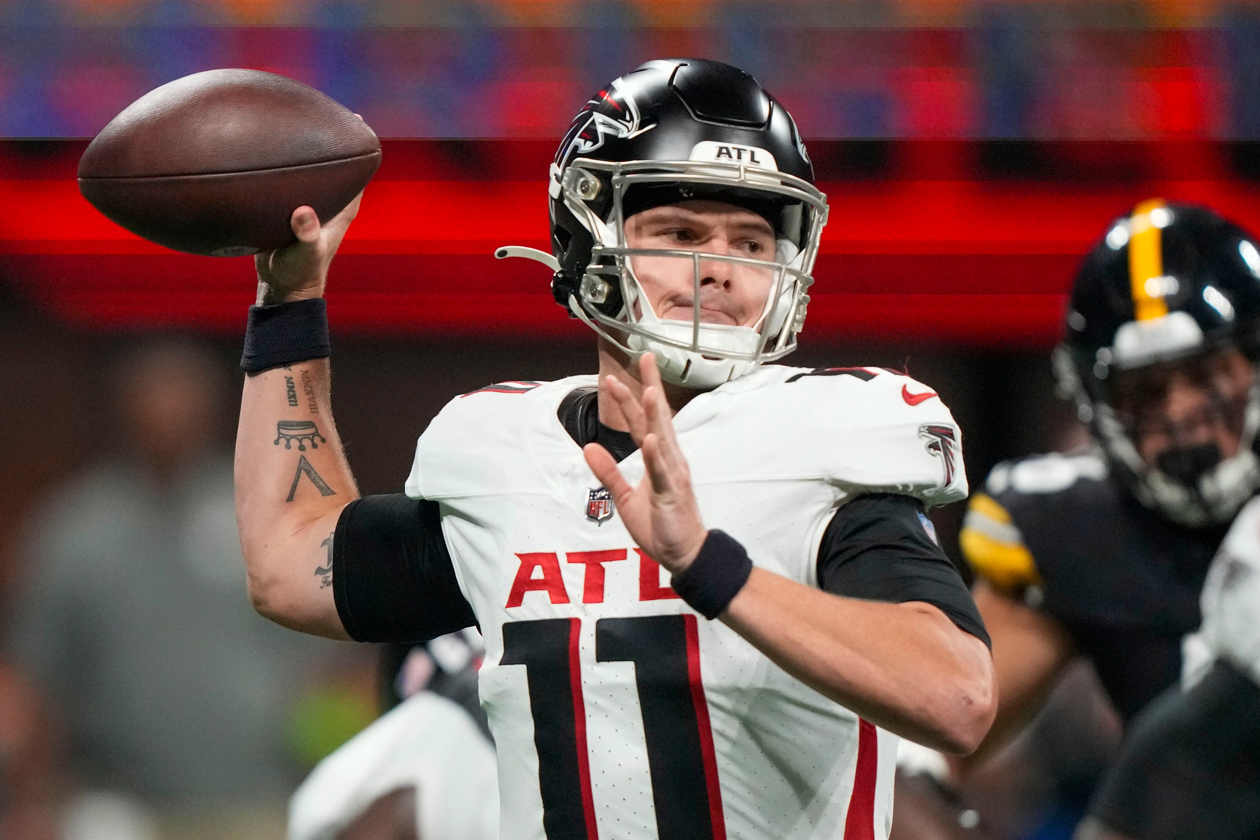 AP source: QB Heinicke returning home to sign with Falcons